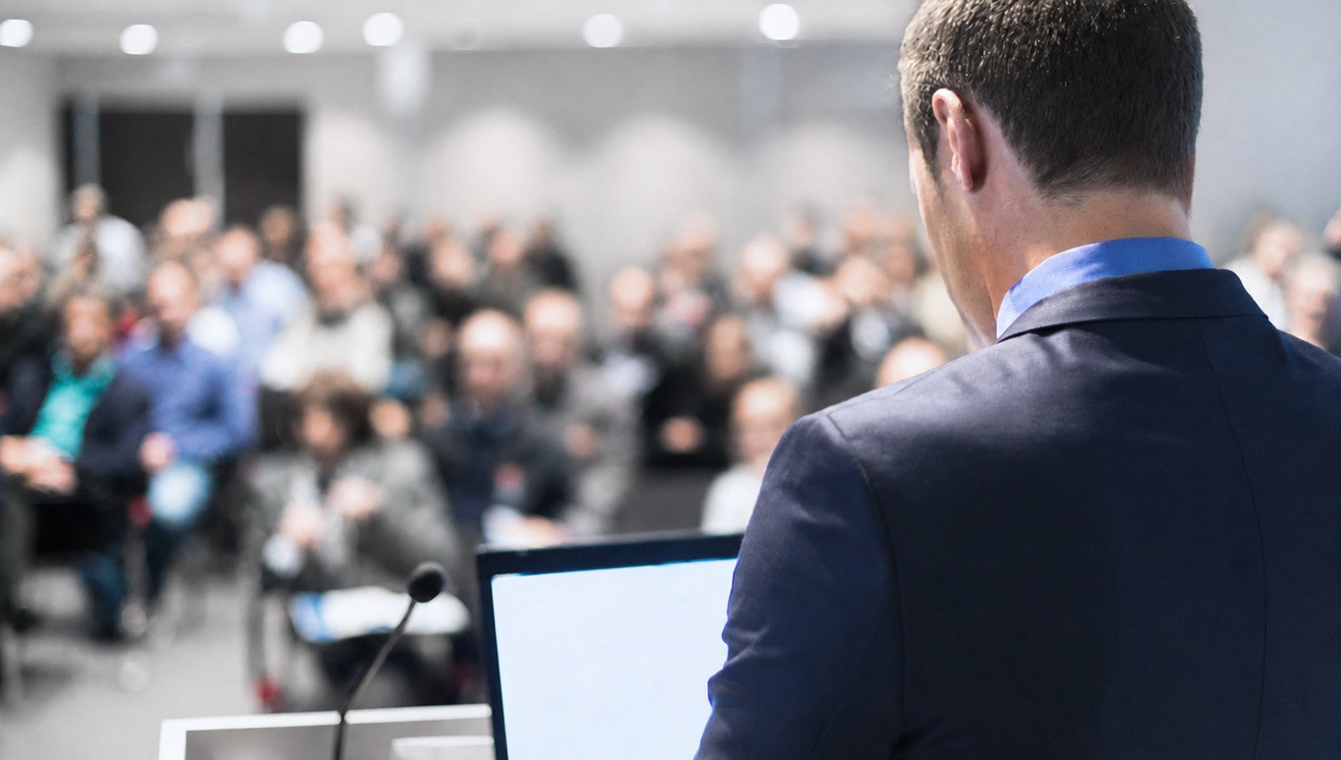 Speaker addressing a union assembly.