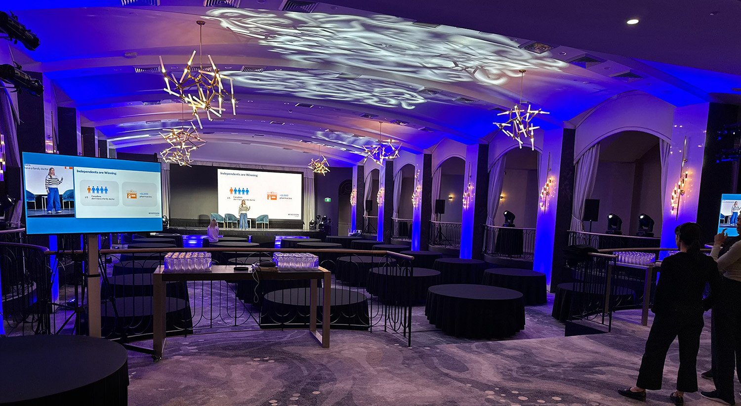 Corporate conference venue prepared for a live presentation.