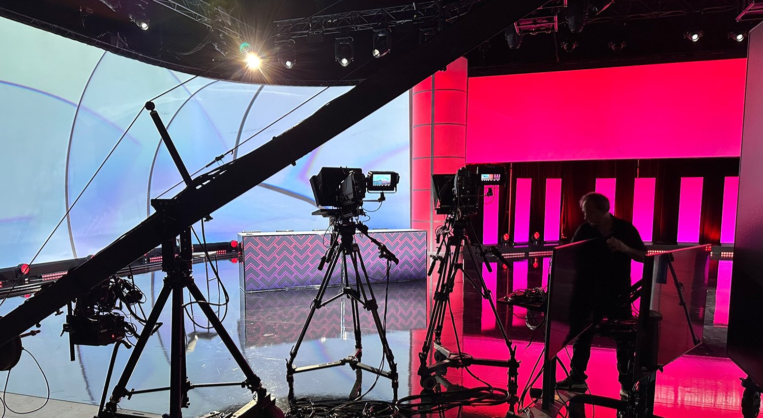 Professional broadcast studio equipped for a live corporate event.