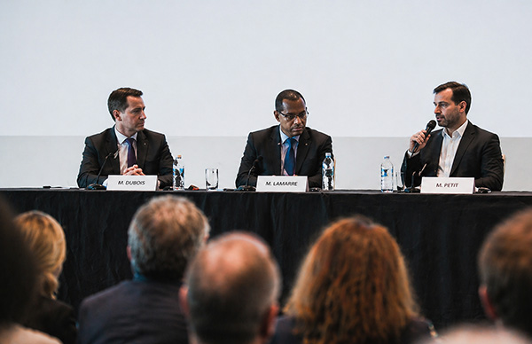 Board chair speaking during an annual general meeting.