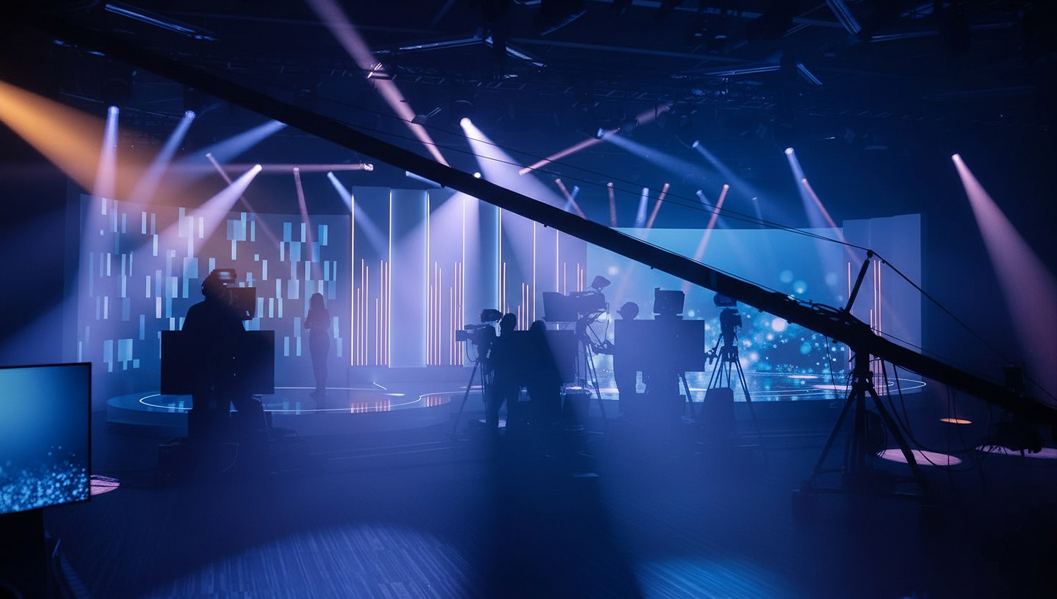 Audiovisual production crew preparing a corporate event in a live production environment.